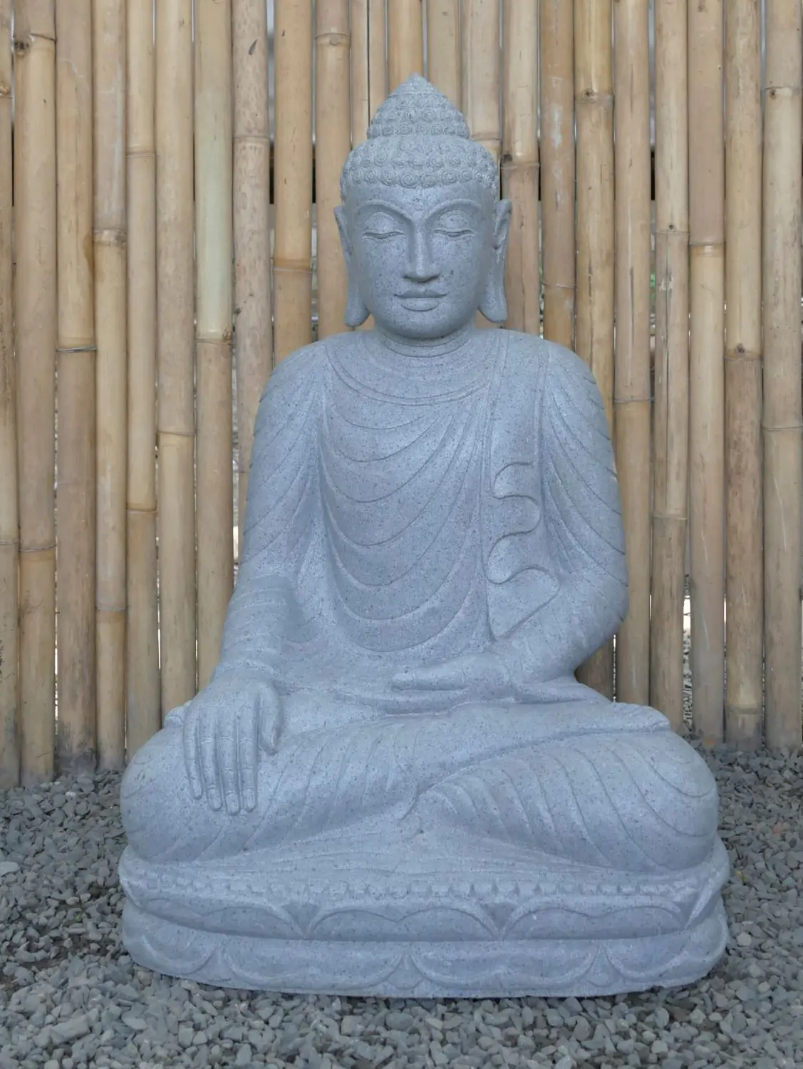  Product image 1 of the product “Seated Buddha made of Riverstone in Bhumisparsha - gesture of touching the earth. 80cm height. ”